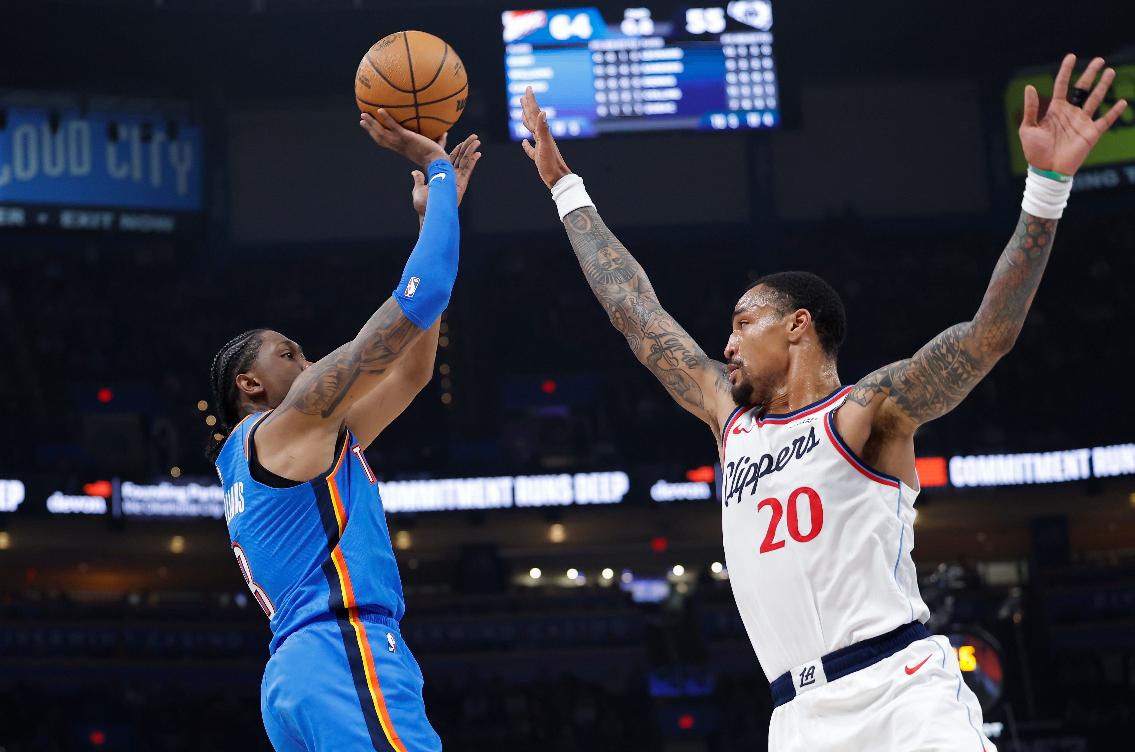 Dec 18, 2025; Oklahoma City, Oklahoma, USA; Oklahoma City Thunder guard Jalen Williams (8) shoots as Los Angeles Clippers forward John Collins (20) defends during the second quarter at Paycom Center. Mandatory Credit: Alonzo Adams-Imagn Images