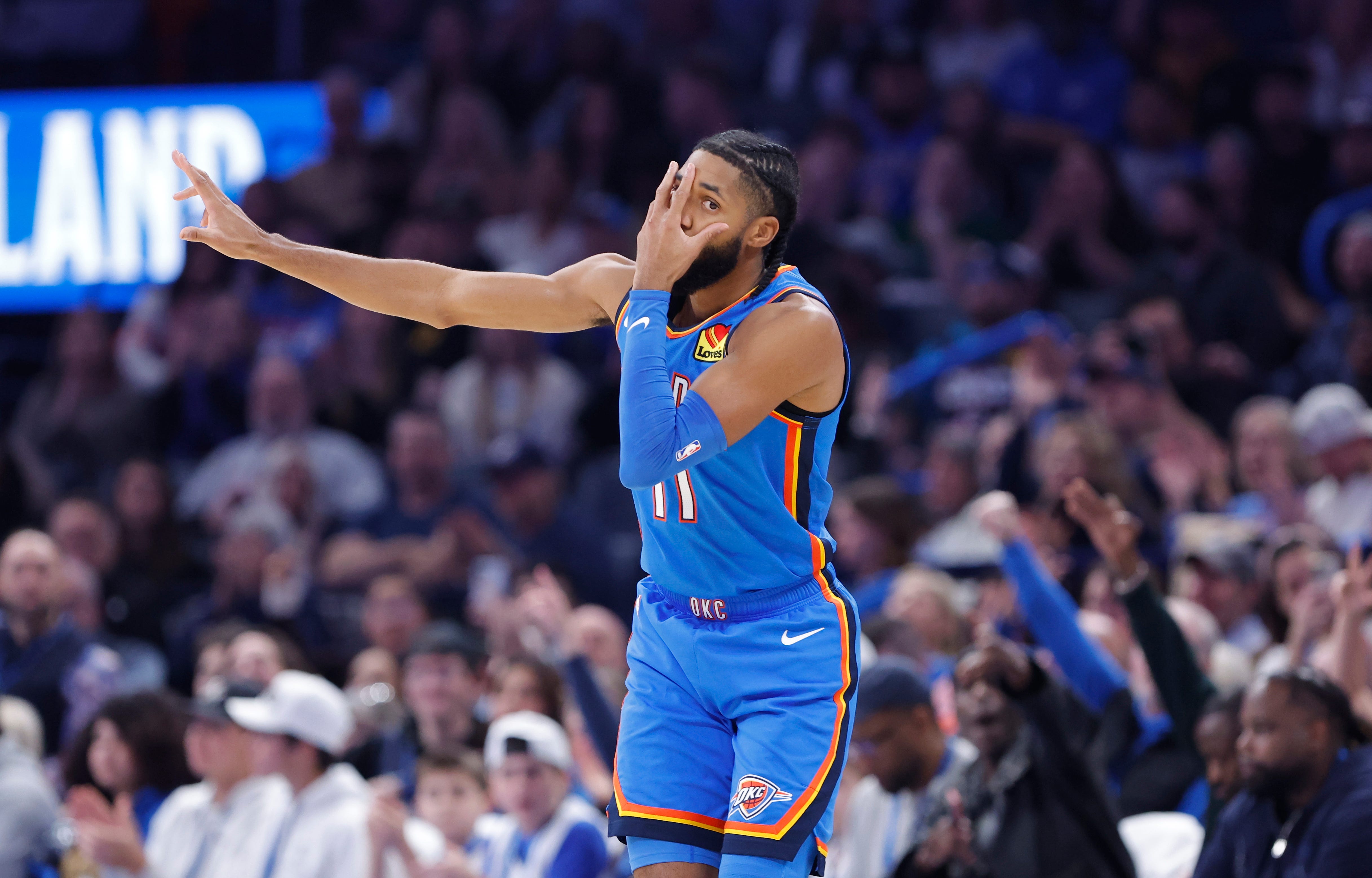 Dec 18, 2025; Oklahoma City, Oklahoma, USA; Oklahoma City Thunder guard Isaiah Joe (11) gestures after scoring against the Los Angeles Clippers during the second half at Paycom Center. Mandatory Credit: Alonzo Adams-Imagn Images