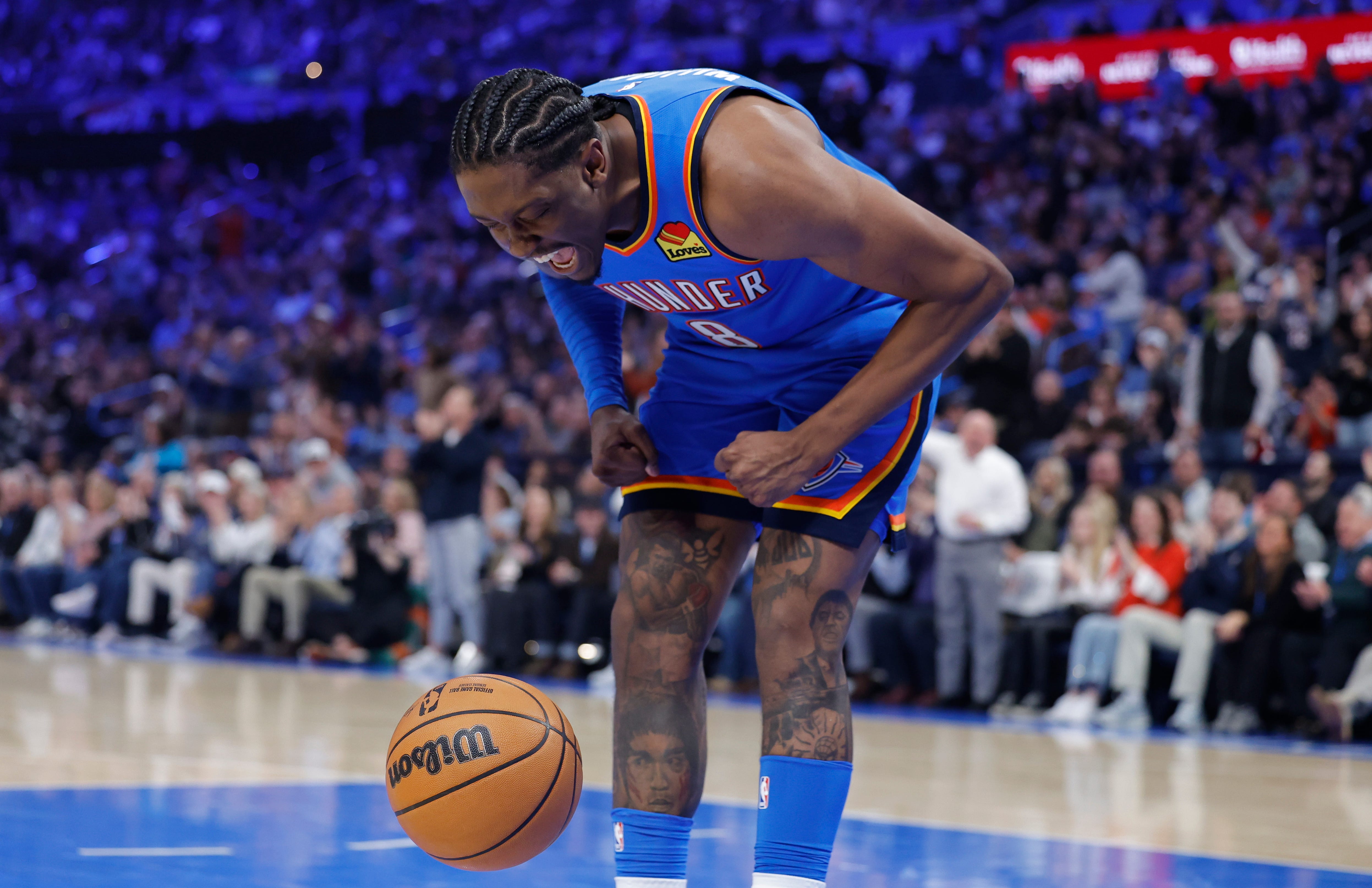 Dec 18, 2025; Oklahoma City, Oklahoma, USA; Oklahoma City Thunder guard Jalen Williams screams at the ball as he celebrates after dunking against the Los Angeles Clippers during the second quarter at Paycom Center. Mandatory Credit: Alonzo Adams-Imagn Images