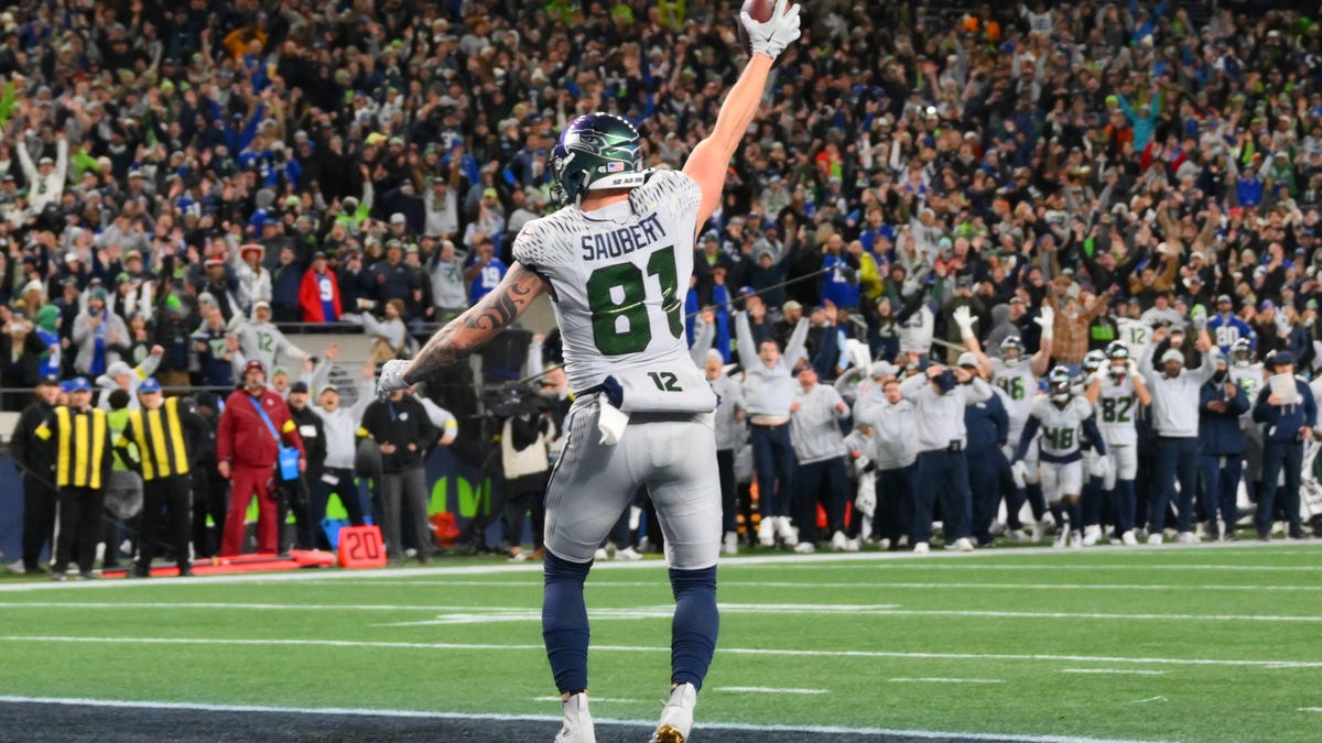 Seattle Seahawks tight end Eric Saubert (81) makes a catch for a game-winning two-point conversion against the Los Angeles Rams in overtime at Lumen Field on Dec. 18, 2025, in Seattle.