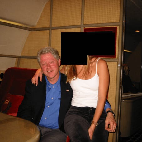 Former President Bill Clinton with an unidentified woman in a photo that was part of thousands of files related to Jeffrey Epstein released by the Department of Justice on Dec. 19, 2025. The images were released by the DOJ without location information, dates or context.