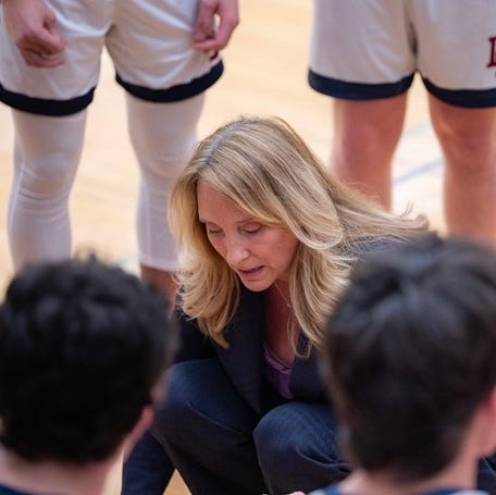 Linda Martindale instructs her team.