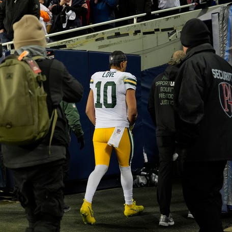 Jordan Love leaves the field during the second quarter against the Chicago Bears.