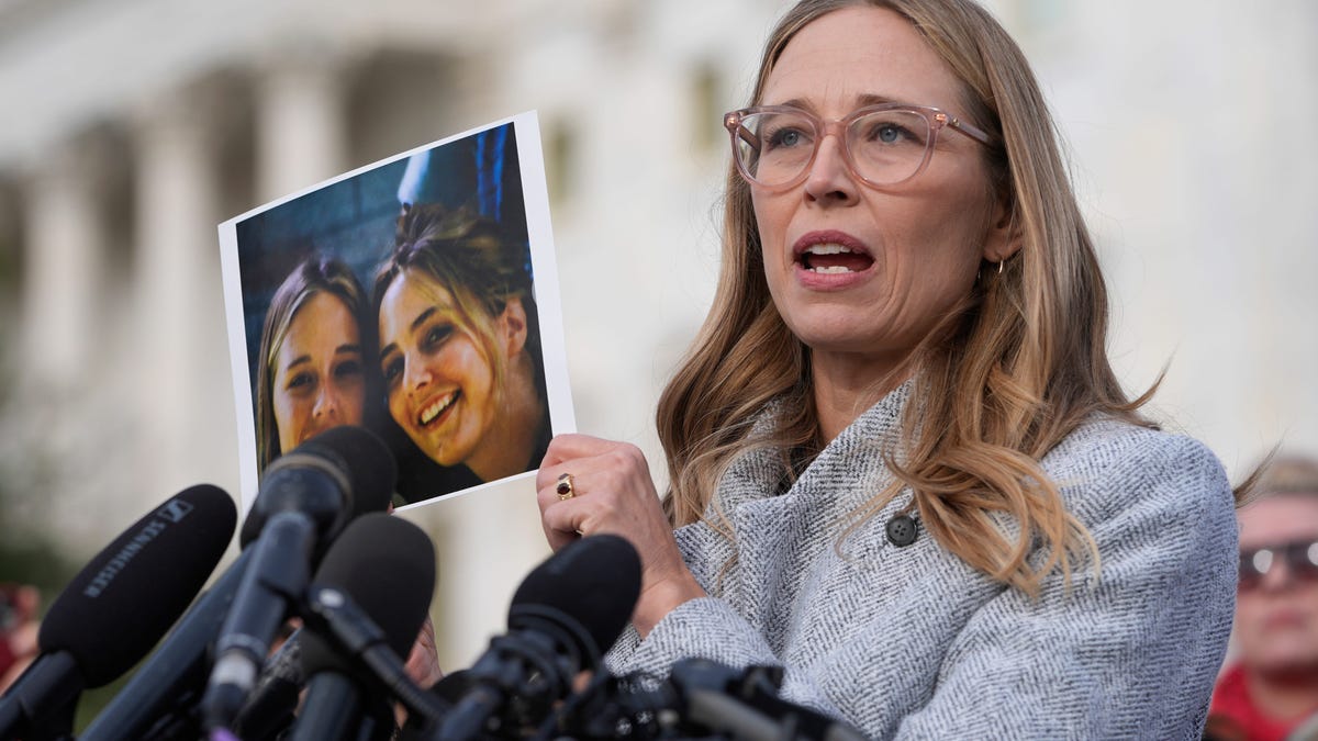 Annie Farmer, whose sister Maria Farmer, shown in the photo with herself, was the first woman to file a criminal complaint against accused sex trafficker Jeffrey Epstein in 1996, speaking on Nov. 18, 2025 along with survivors.