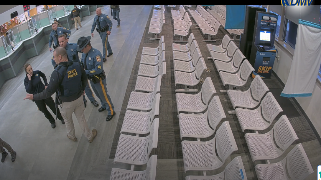 Delaware police officers from both Delaware State Police and New Castle County could be seen moving about on livestreamed video footage inside the Division of Motor Vehicles near New Castle on Dec. 23 after an active shooter alert from DSP closed the state location.