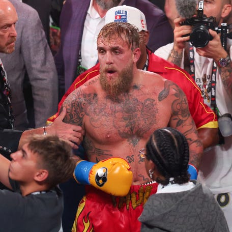 Jake Paul looks on after losing against Anthony Joshua during a heavyweight boxing bout at Kayesa Center.