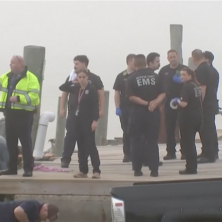 A screenshot from a video shows rescue and search personnel working the scene after a Mexican medical transport plane carrying 8 passengers crashed into the water off the coast of Galveston, Texas, on Monday, Dec. 22, 2025.
