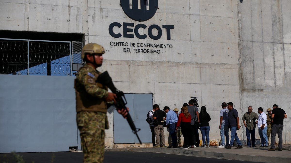 A Salvadoran soldier stands guard during a media tour at the Terrorism Confinement Center (CECOT) prison in Tecoluca, El Salvador, on April 4, 2025