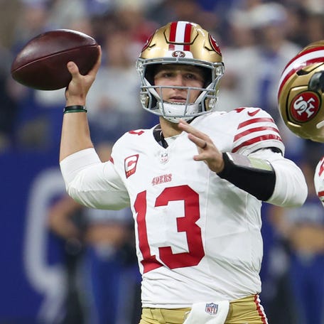 Dec 22, 2025; Indianapolis, Indiana, USA; San Francisco 49ers quarterback Brock Purdy (13) passes the ball against the Indianapolis Colts in the first quarter of the game at Lucas Oil Stadium. Mandatory Credit: Trevor Ruszkowski-Imagn Images