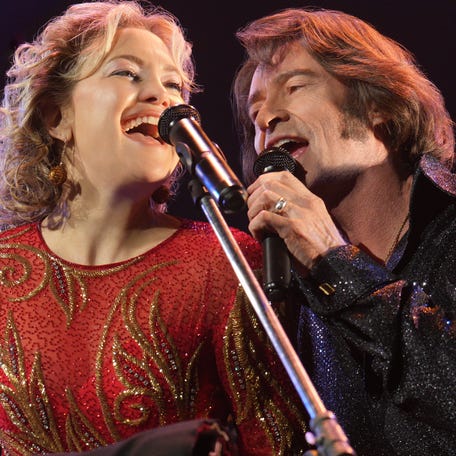 Kate Hudson and Hugh Jackman play a popular Milwaukee Neil Diamond tribute act in the musical drama "Song Sung Blue."