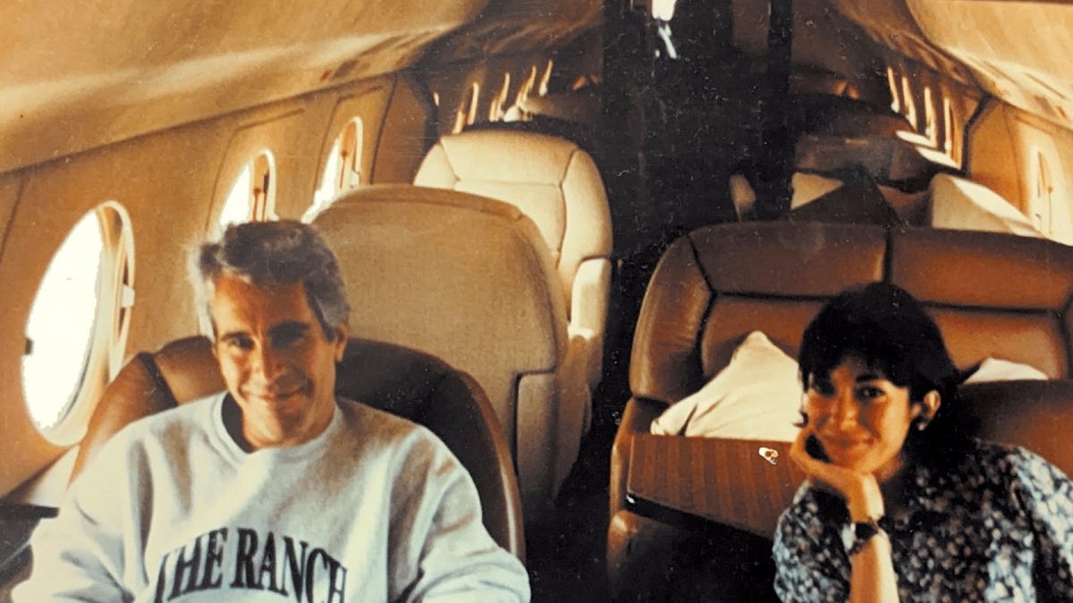 Ghislaine Maxwell and Jeffrey Epstein are seen in this image released by the Department of Justice in Washington, D.C., U.S., on December 19, 2025 as part of a new trove of documents from its investigations into the late financier and convicted sex offender Jeffrey Epstein. U.S. Justice Department/Handout via REUTERS THIS IMAGE HAS BEEN SUPPLIED BY A THIRD PARTY