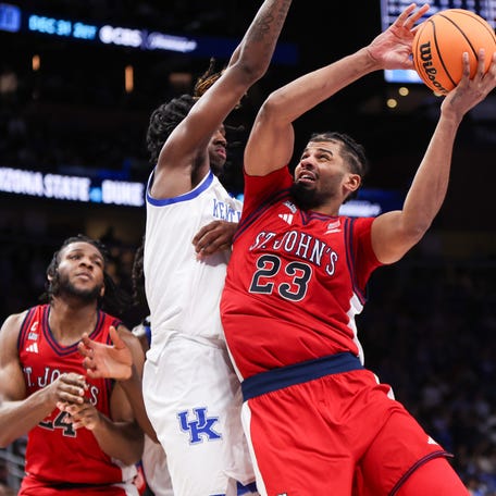 Dec 20, 2025; Atlanta, Georgia, USA; St. John Red Storm forward Bryce Hopkins (23) shoots against the Kentucky Wildcats in the second half at State Farm Arena. Mandatory Credit: Brett Davis-Imagn Images