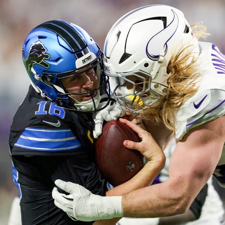 MINNEAPOLIS, MINNESOTA - DECEMBER 25: Jared Goff #16 of the Detroit Lions is sacked by Andrew van Ginkel #43 of the Minnesota Vikings during the second quarter at U.S. Bank Stadium on December 25, 2025 in Minneapolis, Minnesota. (Photo by David Berding/Getty Images)