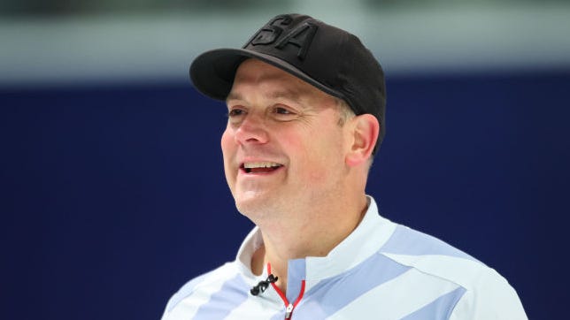 Rich Ruohonen of the United States smiles during the Mixed Doubles Olympic Trials final at Curl Mesabi Curling Club on October 31, 2021 in Eveleth, Minnesota.