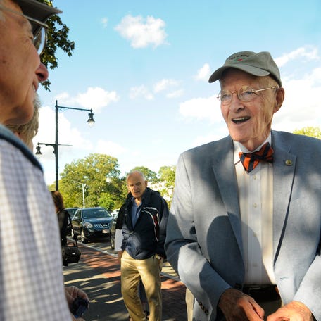 Dr. Leonard Morse is greeted by friends at the dedication of Morse Stroll around Elm Park on Aug. 28, 2015.