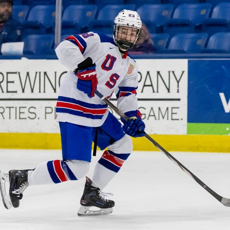 Cole Hutson, shown at the Five Nations Tournament, left the USA's world junior championships game on a stretcher.