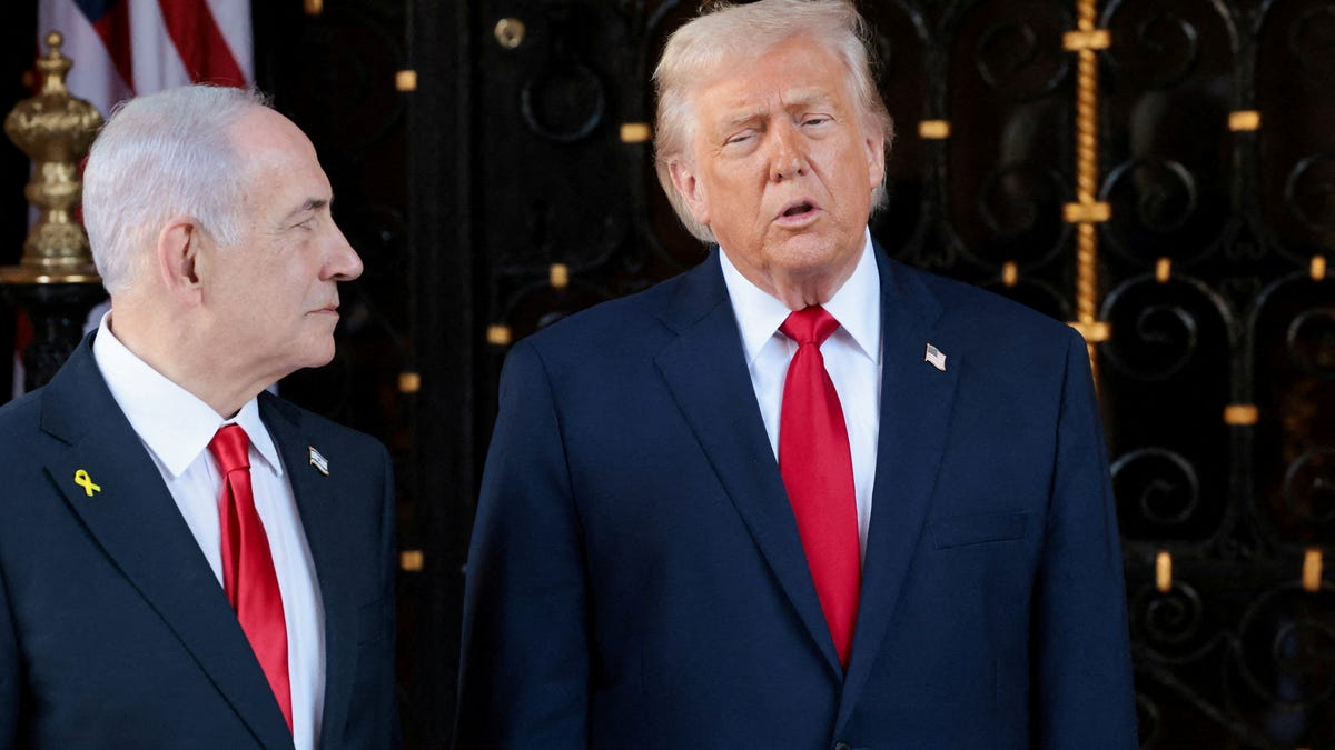President Donald Trump speaks next to Israeli Prime Minister Benjamin Netanyahu upon arrival for meetings at Trump's Mar-a-Lago club in Palm Beach, Florida, U.S., December 29, 2025.