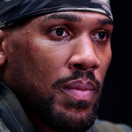 Anthony Joshua speaks at a press conference after Jake Paul v Anthony Joshua at Kaseya Center on December 19, 2025 in Miami, Florida.