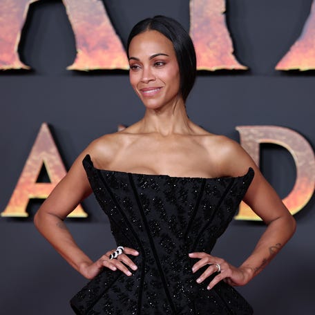 Zoe Saldaña attends the "Avatar: Fire And Ash" European premiere on Dec. 5, 2025, in Boulogne-Billancourt, France.