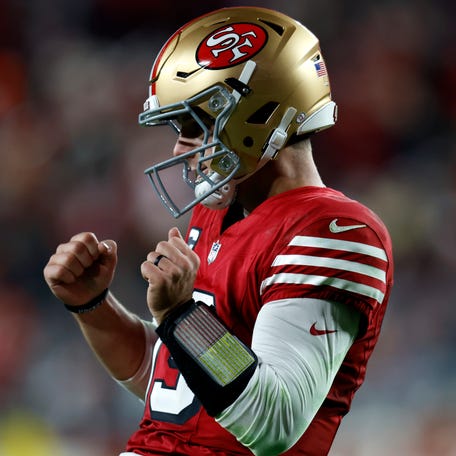 San Francisco 49ers quarterback Brock Purdy (13) celebrates after a touchdown against the Chicago Bears in the second half at Levi's Stadium.