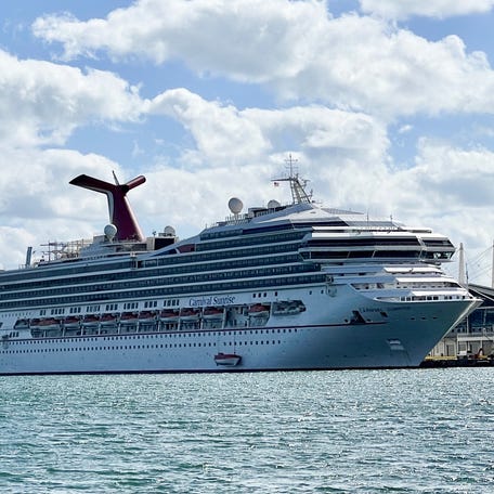 The cruise ship Carnival Sunrise is seen moored at a quay in the port of Miami, Florida, on December 23, 2020.