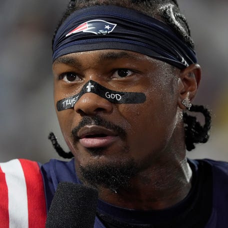 New England Patriots wide receiver Stefon Diggs talks with a sidelines reporter before the Bills home game against the New England Patriots at Highmark Stadium in Orchard Park on Oct. 5, 2025.
