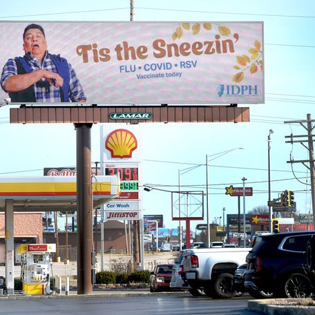 A sign on Wabash Ave. in Springfield, Illinois, on Dec. 20, 2023 reminds people to get vaccinated for flu, COVID-19 and RSV.