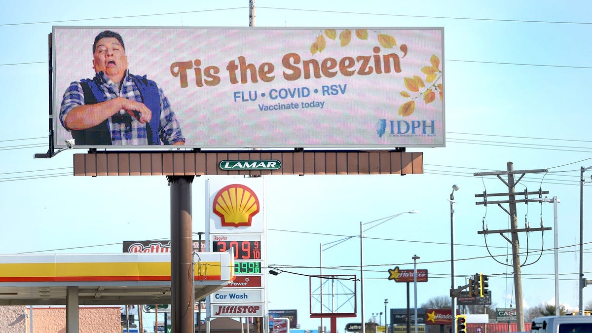 A sign on Wabash Ave. in Springfield, Illinois, on Dec. 20, 2023 reminds people to get vaccinated for flu, COVID-19 and RSV.