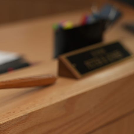 A judge's gavel rests on the bench inside one of the courtrooms at the new Family Court of Delaware building in Georgetown on November 12, 2025.