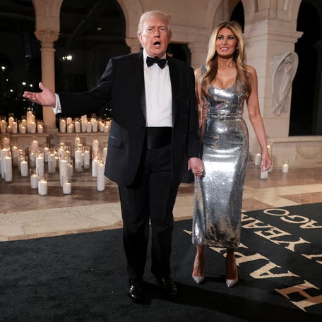 U.S. President Donald Trump and first lady Melania Trump arrive to attend a New Year's Eve party with members and guests at Trump's Mar-a-Lago Club in Palm Beach, Florida, U.S., December 31, 2025. REUTERS/Jonathan Ernst