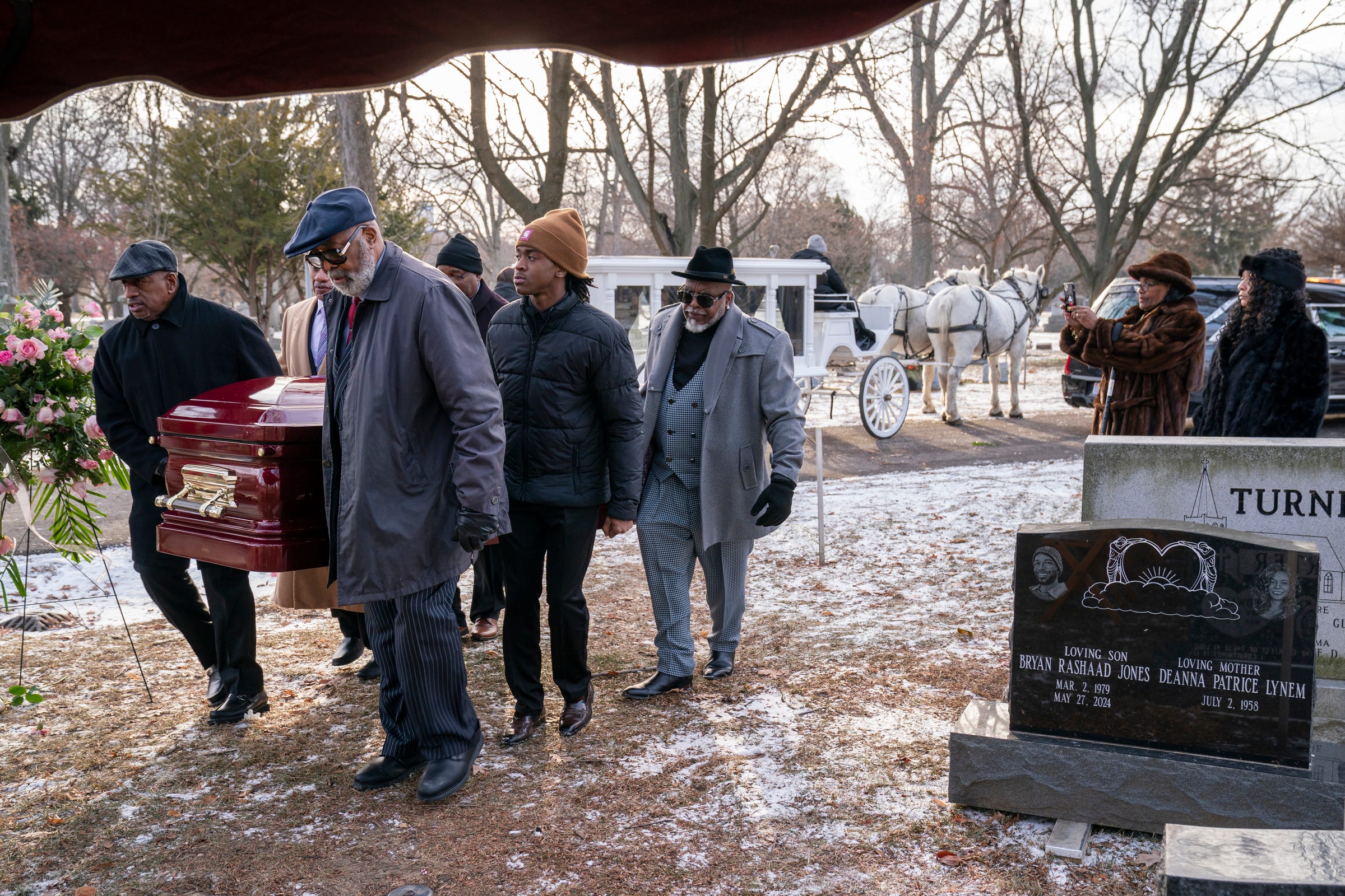 Top Hats and Tails Carriage Company led a funeral procession to Elmwood Cemetery for 98-year-old family matriarch Ruby Smith, of Detroit.