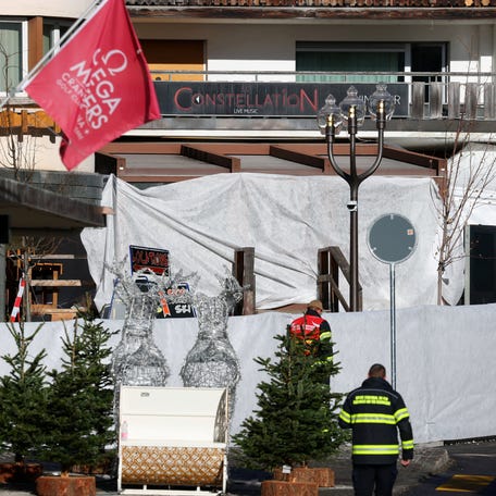 Emergency personnel work at the site of an explosion and fire at the "Le Constellation" bar, where several people died and others were injured after an explosion tore through a crowded New Year's Eve party, according to Swiss police, in the upscale ski resort of Crans-Montana in southwestern Switzerland, Jan. 1, 2026.