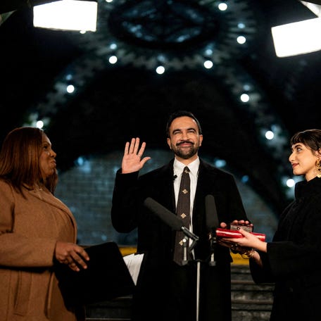 Zohran Mamdani is sworn in as mayor of New York City, flanked by his wife and New York Attorney General Letitia James on Jan. 1, 2026.