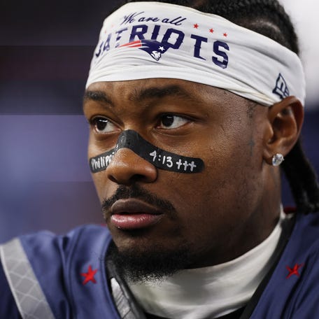 FOXBOROUGH, MASSACHUSETTS - NOVEMBER 13: Stefon Diggs #8 of the New England Patriots watches action during a game against the New York Jets at Gillette Stadium on November 13, 2025 in Foxborough, Massachusetts.
