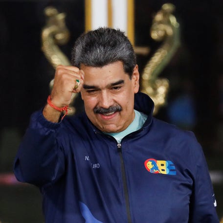 Venezuela's President Nicolas Maduro gestures on the day of a march marking Venezuelan Student Day, in Caracas, Venezuela, November 21, 2025.