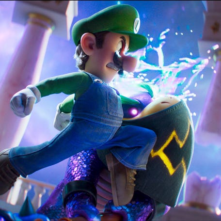 Luigi (voiced by Charlie Day) throws down with Bowser Jr. (Benny Safdie) in the animated adventure sequel "The Super Mario Galaxy Movie."