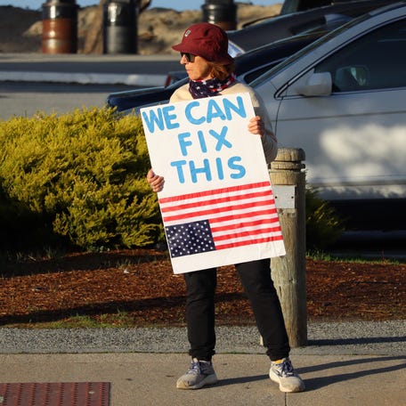 A demonstrator in Monterey, California, on Jan. 3, 2026,