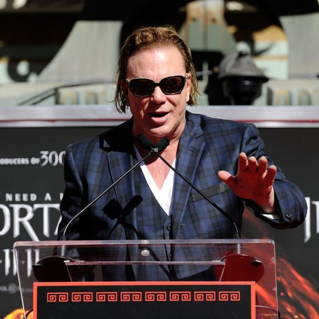 Mickey Rourke speaks onstage at his Hand and Footprint Ceremony held at Grauman's Chinese Theatre on Oct. 31, 2011 in Hollywood, California.