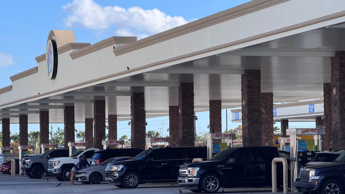 A row of cars refuel at the 104-pump Buc-ee's mega gas station/travel convenience center off of Interstate 95 Exit 265 in Daytona Beach, Florida, on Tuesday, Jan. 6, 2026.