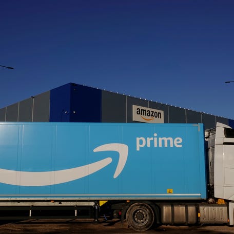 The logo of Amazon Prime Delivery is seen on the trailer of a truck outside the company logistics center in Lauwin-Planque, northern France, on Dec. 30, 2019.