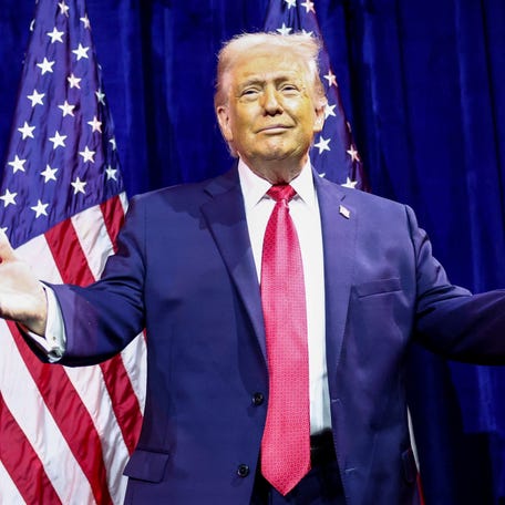 President Donald Trump gestures as he arrives to address House Republicans at their annual issues conference retreat, at the Kennedy Center, renamed the Trump-Kennedy Center by the Trump-appointed board of directors, in Washington, D.C.