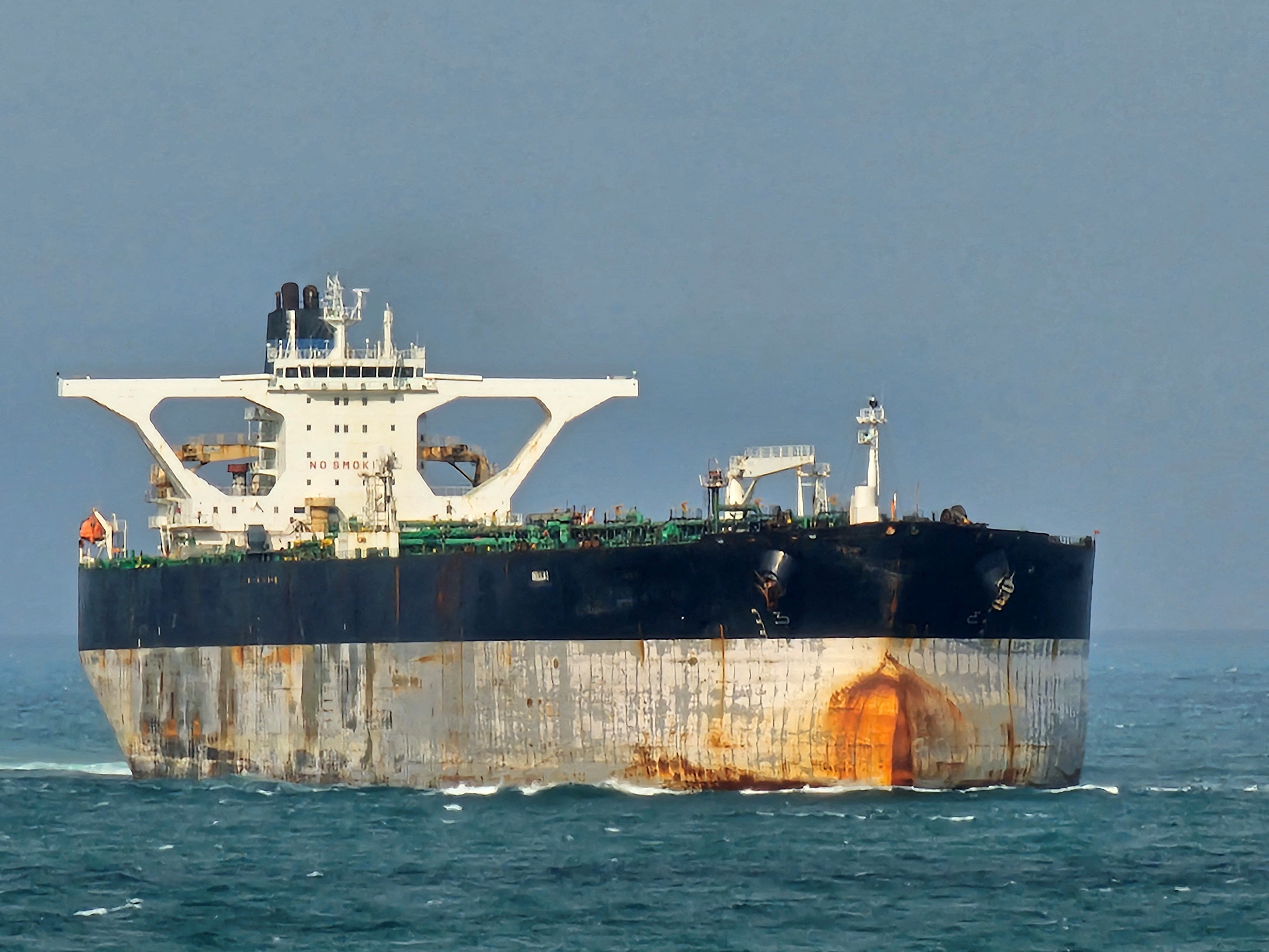U.S. forces boarded a Venezuela-linked oil tanker sailing under a Russian flag that had evaded a U.S. blockade, officials said.