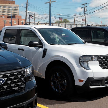 2025 Ford Maverick pickup trucks sit on a dealership lot for sale in Dearborn, Michigan, U.S., May 7, 2025.