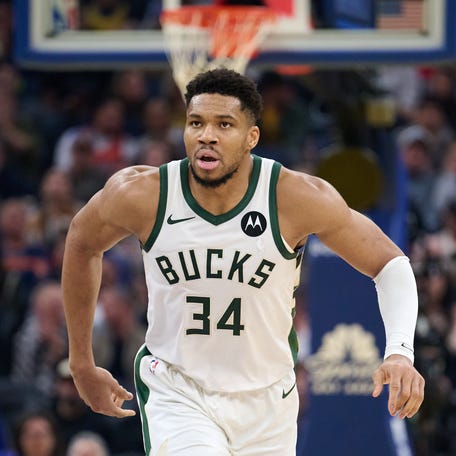 Milwaukee Bucks forward Giannis Antetokounmpo runs back on defense against the Golden State Warriors during the second quarter at Chase Center.