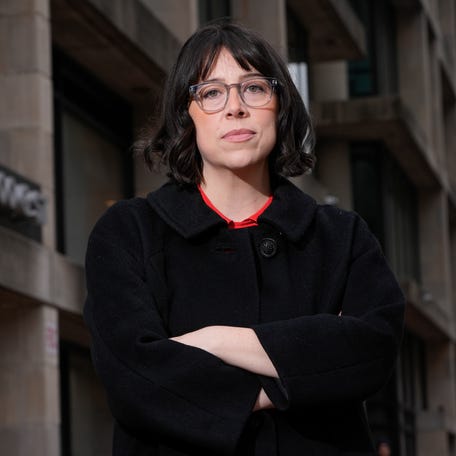 Erie Meyer, former Consumer Finance Protection Bureau (CFPB) chief technologist, stands in front of the building that housed the Consumer Finance Protection Bureau in Washington, DC. Meyer and her team built the CFPB consumer protection complaint database in 2011. She resigned from the agency in February 2025.