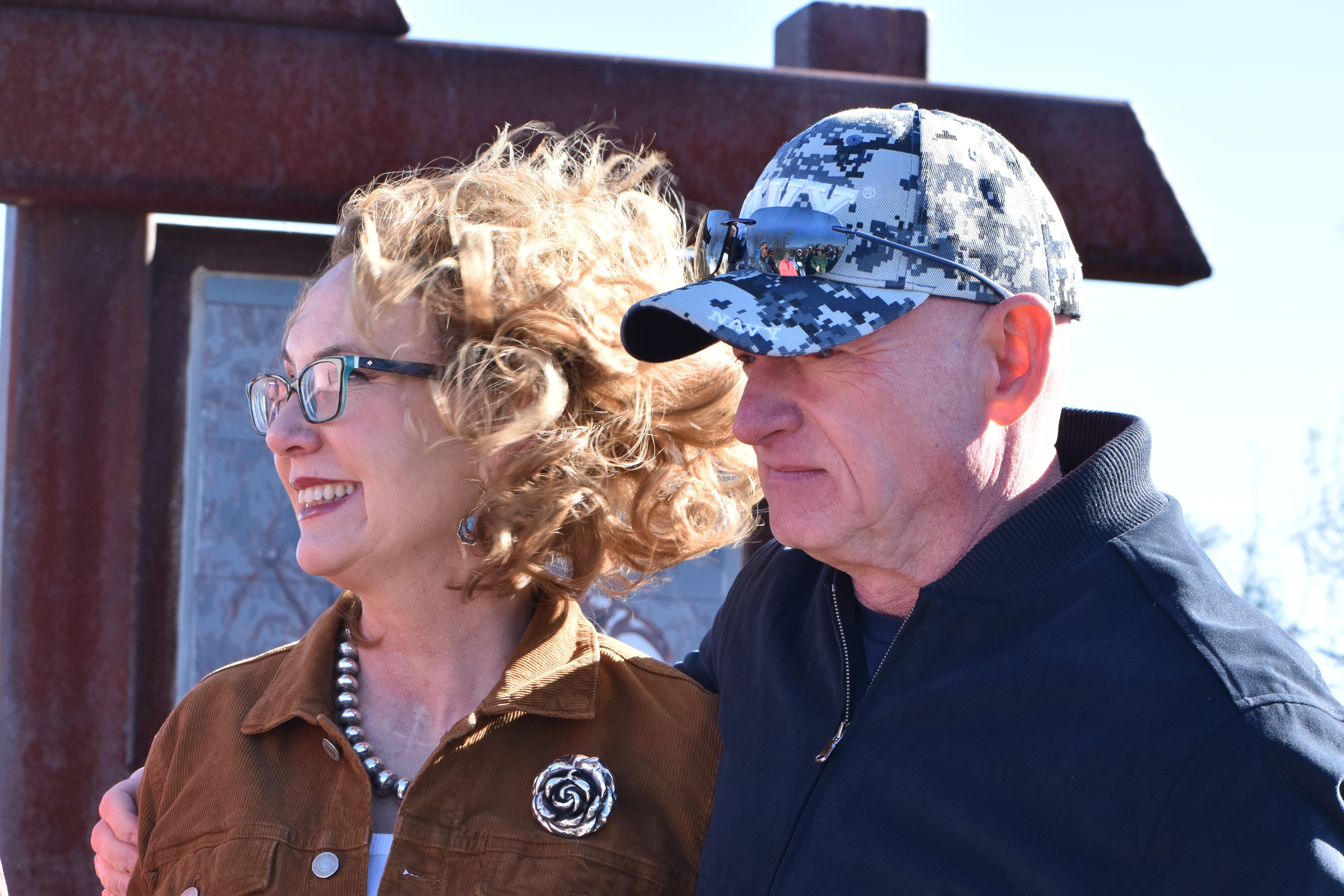 Gabrielle Giffords and U.S. Sen. Mark Kelly visit a memorial near Tucson 15 years after a shooting that injured her and 12 others and killed six.