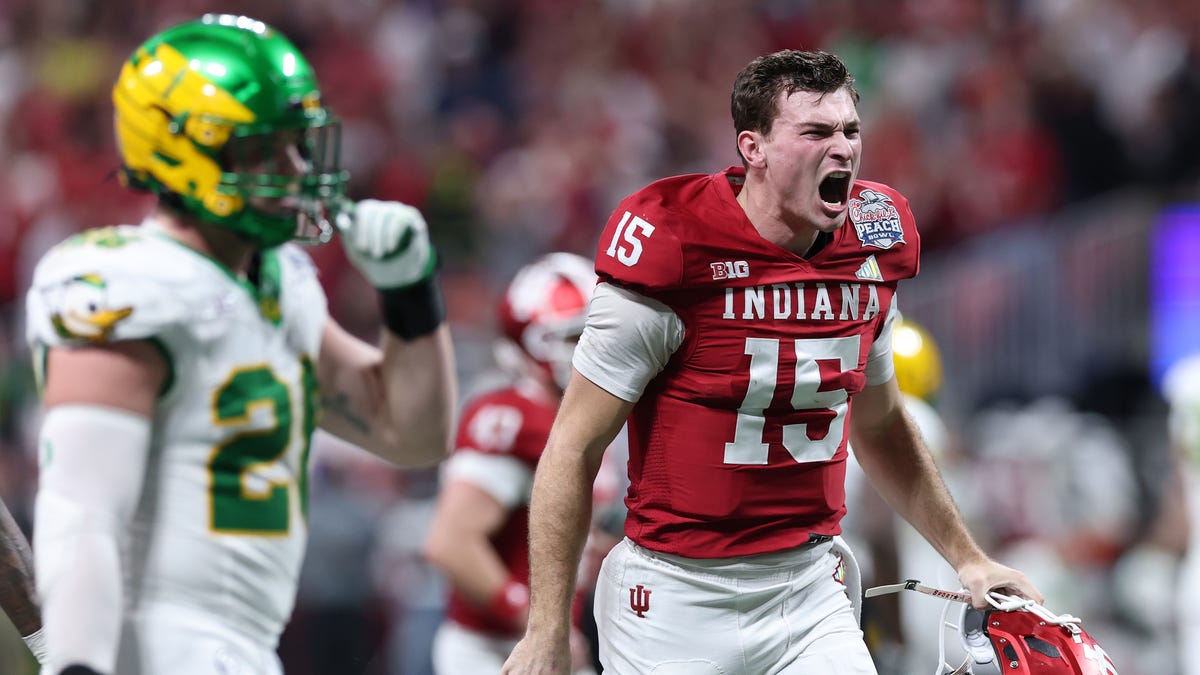 ATLANTA, GEORGIA - JANUARY 09: Fernando Mendoza #15 of the Indiana Hoosiers celebrates a touchdown pass against the Oregon Ducks during the second quarter in the 2025 College Football Playoff Semifinal at the Chick-fil-A Peach Bowl at Mercedes-Benz Stadium on January 09, 2026 in Atlanta, Georgia. (Photo by Kevin C. Cox/Getty Images)