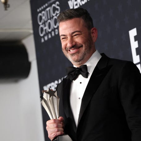 TV host Jimmy Kimmel poses in the press room with the Best Talk Show award for "Jimmy Kimmel Live!" during the 31st Annual Critics Choice Awards at Barker Hangar in Santa Monica, California, on January 4, 2026. (Photo by Michael Tran / AFP via Getty Images)