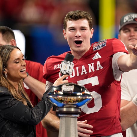 Jan 9, 2026; Atlanta, GA, USA; Indiana Hoosiers quarterback Fernando Mendoza (15) reacts after the 2025 Peach Bowl and semifinal game of the College Football Playoff at Mercedes-Benz Stadium. Mandatory Credit: Dale Zanine-Imagn Images