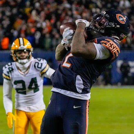 Chicago Bears wide receiver DJ Moore (2) makes the game-winning touchdown catch against the Green Bay Packers during the second half of an NFC Wild Card Round game at Soldier Field on Jan. 10, 2026, in Chicago.